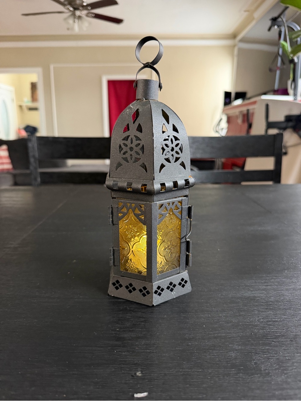 Ornate Black Metal Lantern with Amber-Style Glass Accent
